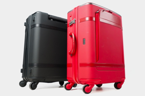 a red and black suitcases