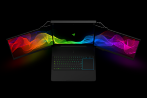 a laptop with rainbow colored lights