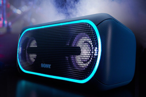 a speaker with a blue light