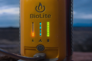 a yellow device with green and blue lights
