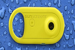 a yellow camera lens on a blue surface