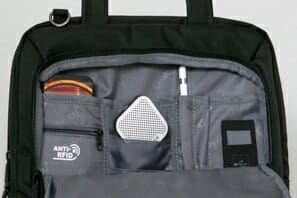 a bag with a speaker and a device in it