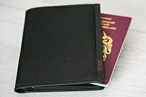 a black wallet with a passport