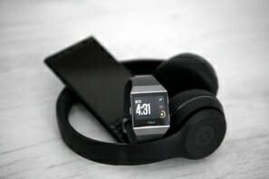 a smart watch and headphones