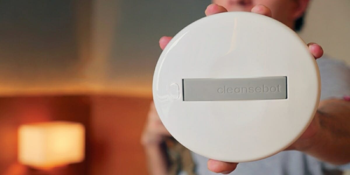 News: CleanseBot Robot a person holding a circular object