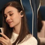 News: Sony WF-1000XM3 Earbuds Lady wears Sony WF-1000XM3 Earbuds on the train.