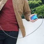 Zendure SuperMini – A 10,000mAh Portable Charger Smaller than a Credit Card a person holding a blue device