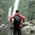CabPack – Office to Weekend Away in One Expandable Backpack Altitude CabPack in front of waterfall