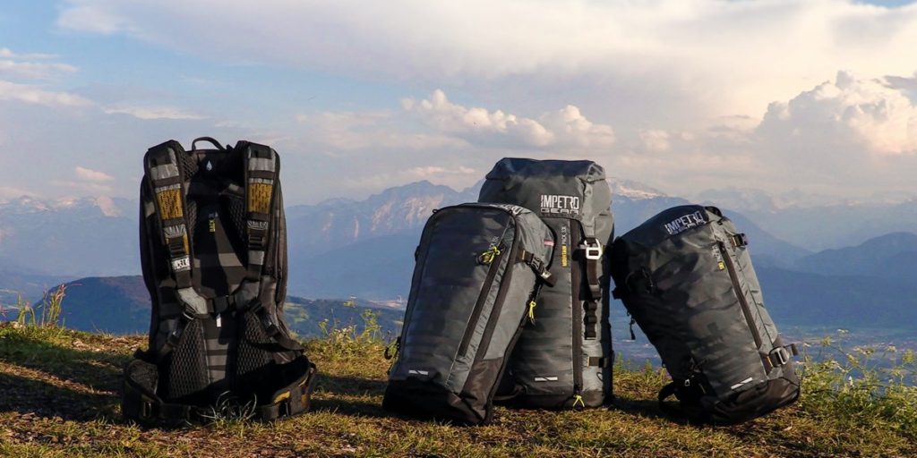 Backpacks on top of a mountain
