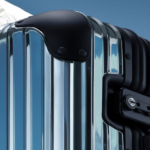 Make a Statement with the New RIMOWA x Moncler Carry-On Close up of aluminium case.
