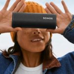 Travellers can now take that Sonos Sound on the Road with the New Roam Portable Speaker a woman holding a speaker over her eyes