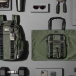 New TUMI Alpha Bravo 2-in-1 Backpacks are Green in More Ways than One a group of items on a gray surface