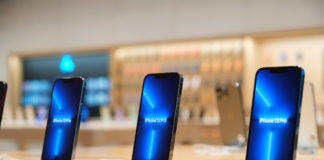 New Apple iPhone 13 & 13 Mini – Overview & Specifications a row of cell phones on a table