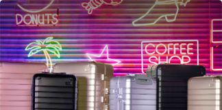 Best Travel Tech Deals: Away Black Friday up to 40% Sale is Happening Now a group of luggage on a blue surface