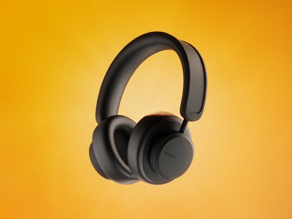 a black headphones on a yellow background