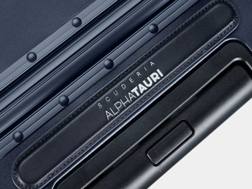 Carl Friedrik x Scuderia AlphaTauri Carry-On Case bespoke handle.  {Tech} for Travel. https://techfortravel.co.uk