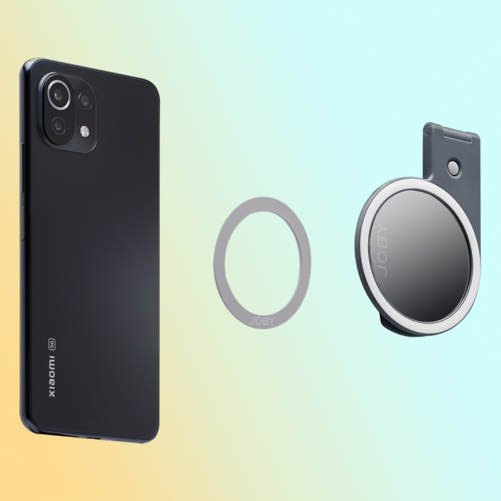 a black cell phone with a circular object