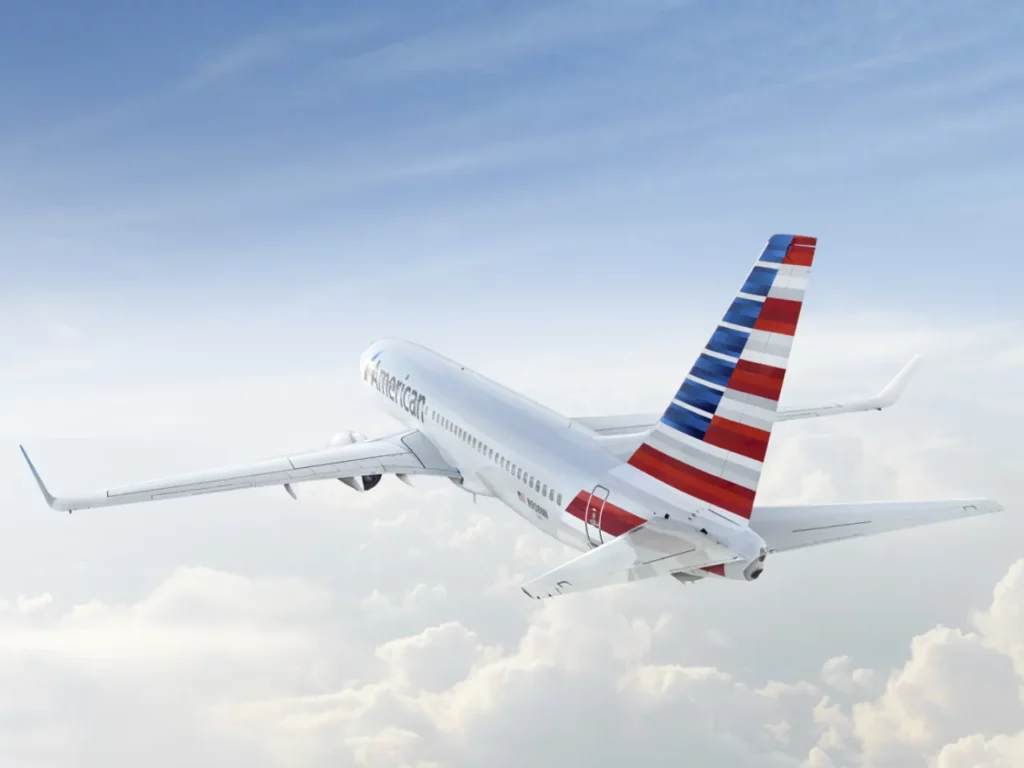 an airplane in the sky.  American Airlines High-Speed Wi-Fi.  {Tech} for Travel. https://techfortravel.co.uk