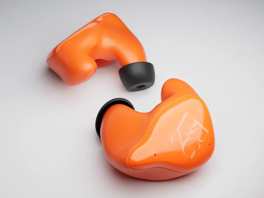 an orange earbuds with black headsets.  CES 2024 News BREGGZ Earbuds.  {Tech} for Travel. https://techfortravel.co.uk