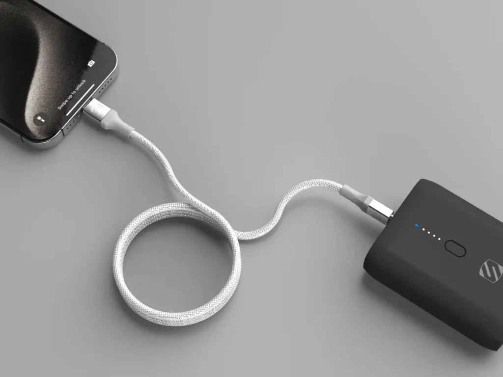 a cell phone charging with a cord. Scosche Cobra Cable. CES 2024 News.  {Tech} for Travel.  https://techfortravel.co.uk