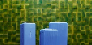 Rimowa Essential Collection Gets a Refresh with Serene Sea Blue a group of blue suitcases on a tiled floor Rimowa Essential Collection