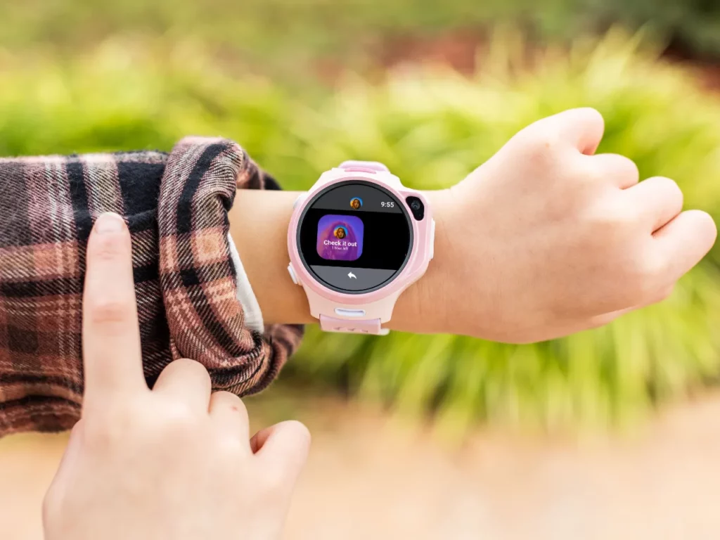 a person wearing a pink watch.  CES 2024 myFirst Fone R2.  {Tech} for Travel. https://techfortravel.co.uk