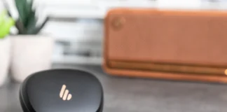 Edifier NeoBuds Pro 2 Review: Redefining Premium Audio a black earbuds on a table. Edifier NeoBuds Pro 2 Earbuds Review