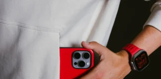 New Limited Edition Nomad Goods Night Watch Red gets the Year Off to a Firey Start a person holding a red cell phone in their pocket