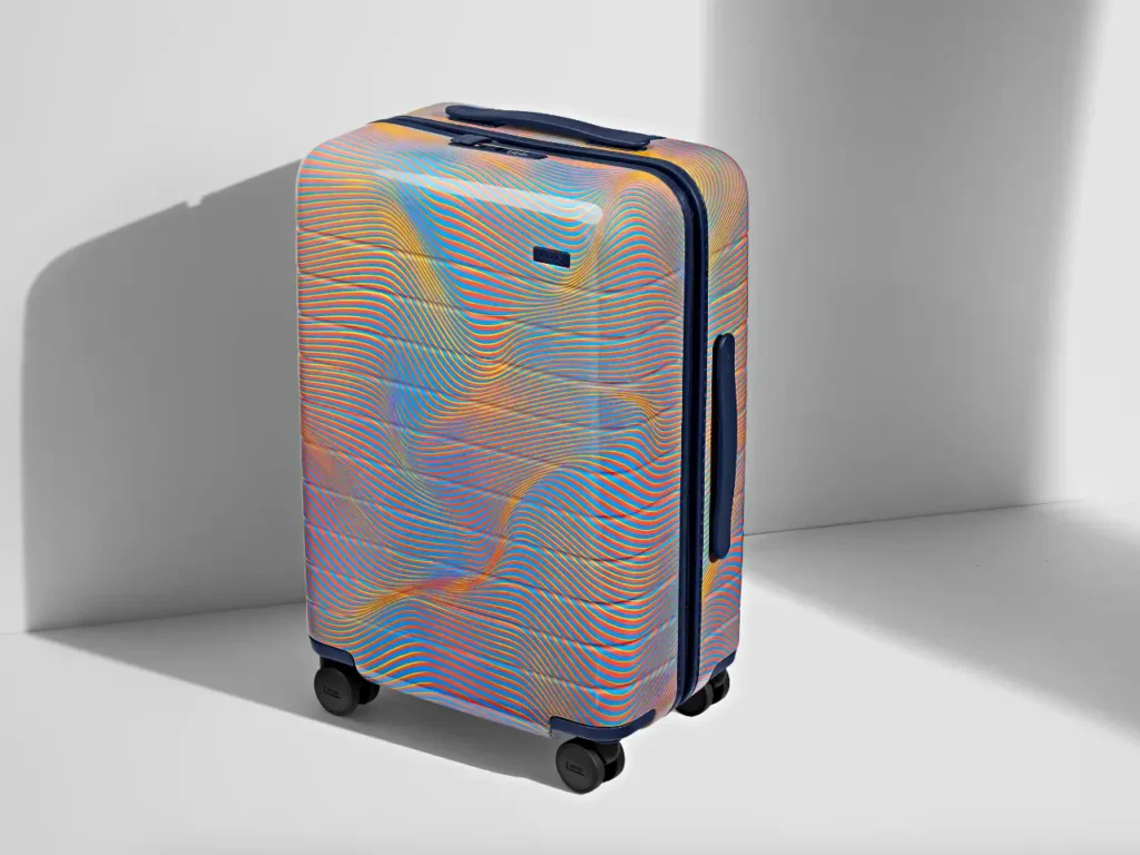 a suitcase with wheels.  Away Soundwave Collection Bigger Carry-on.  {Tech} for Travel. https://techfortravel.co.uk