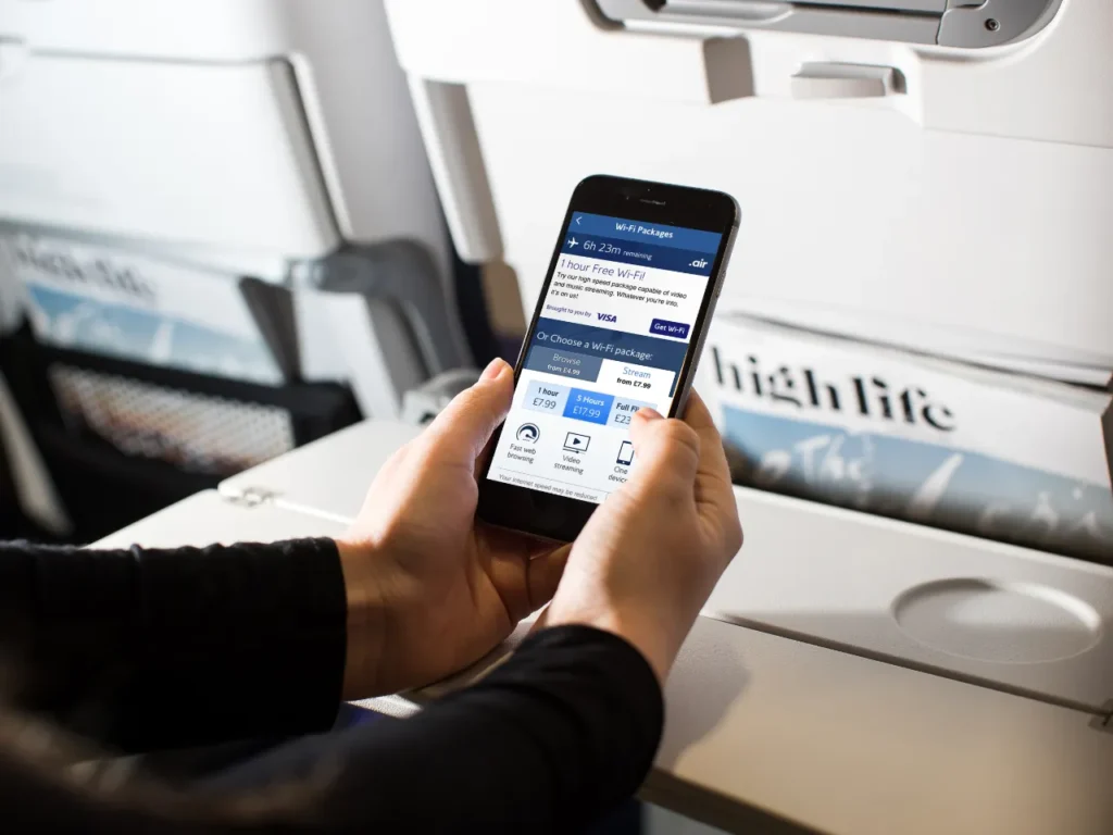 a person holding a phone. British Airways App.  {Tech} for Travel. https://techfortravel.co.uk