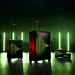 Lights Out for the Globe Trotter Aston Martin F1 2024 Collection a group of luggage with green lights. Globe Trotter Aston Martin 2024 Collection
