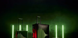 Lights Out for the Globe Trotter Aston Martin F1 2024 Collection a group of luggage with green lights. Globe Trotter Aston Martin 2024 Collection