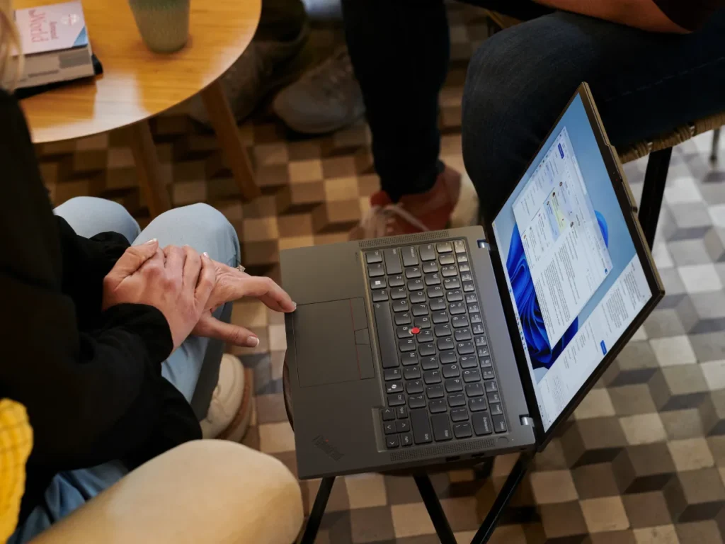 a person using a laptop. Lenovo Smart Connect.  {Tech} for Travel.  https://techfortravel.co.uk