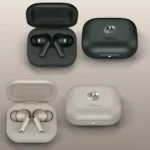 a group of black and white earbuds. Moto Buds+