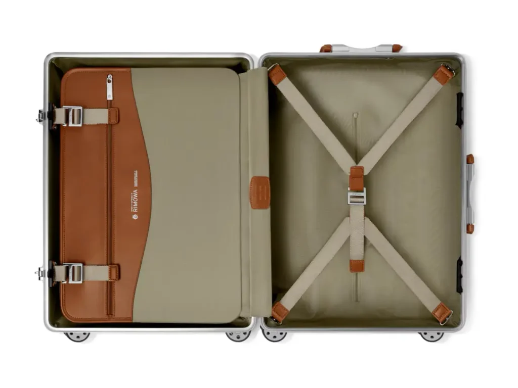 a suitcase with a brown and tan leather bag. RIMOWA Hammerschlag Limited Edition Collection. {Tech} for Travel. https://techfortravel.co.uk