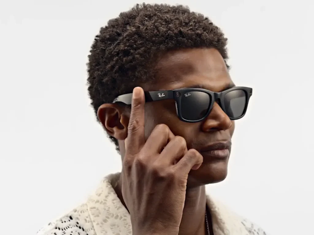 a man wearing sunglasses and touching his face. Ray-Ban Meta Sunglasses.  Father's Day Gifts 2024.  {Tech} for Travel. https://techfortravel.co.uk