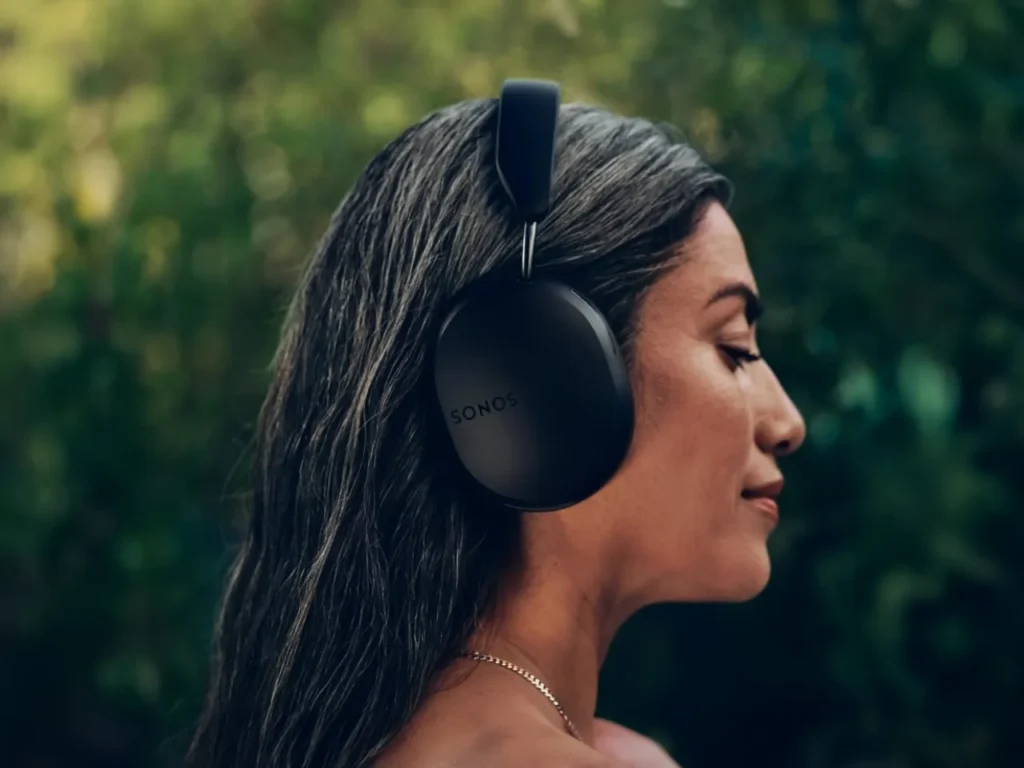 a woman with headphones on. Sonos Ace Headphones.  {Tech} for Travel. https://techfortravel.co.uk