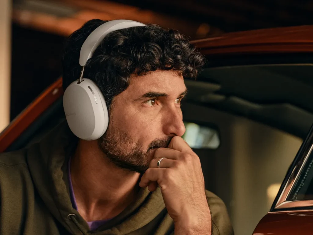 a man wearing headphones.  Sonos Ace Headphones in Soft White.  {Tech} for Travel. https://techfortravel.co.uk