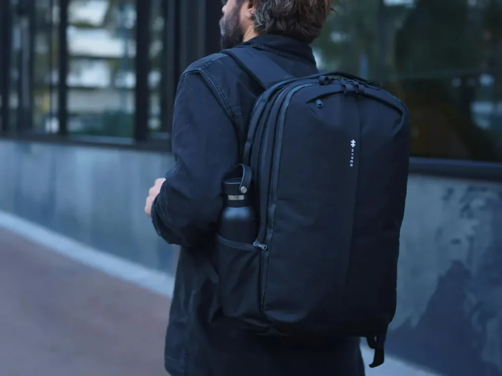 a man wearing a backpack. Targus HyperPack Pro.  {Tech} for Travel. https://techfortravel.co.uk