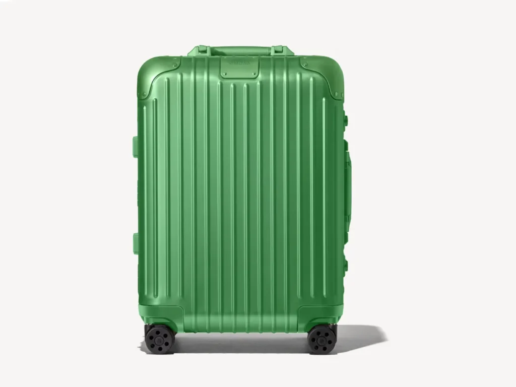 a green suitcase with wheels. Rimowa Emerald Green Collection.  {Tech} for Travel. https://techfortravel.co.uk