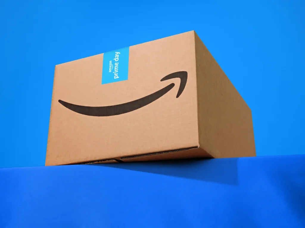 a cardboard box with a smile on it. Amazon Prime Day Sale 2024. {Tech} for Travel. https://techfortravel.co.uk