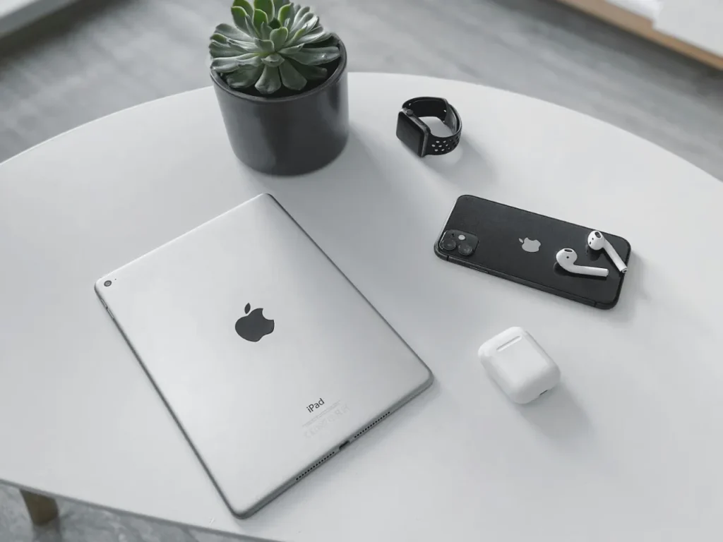 a tablet and phone on a table. Amazon Prime Day Sale apple airpods.  {Tech} for Travel. https://techfortravel.co.uk