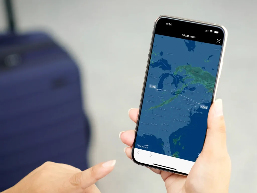 a person holding a cell phone. United Texts Live Radar. {Tech} for Travel. https://techfortravel.co.uk