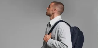Boost Your Carry-On with the New Away Commuter Backpack a man carrying a backpack. Away Commuter Backpack. {Tech} for Travel. https://techfortravel.co.uk