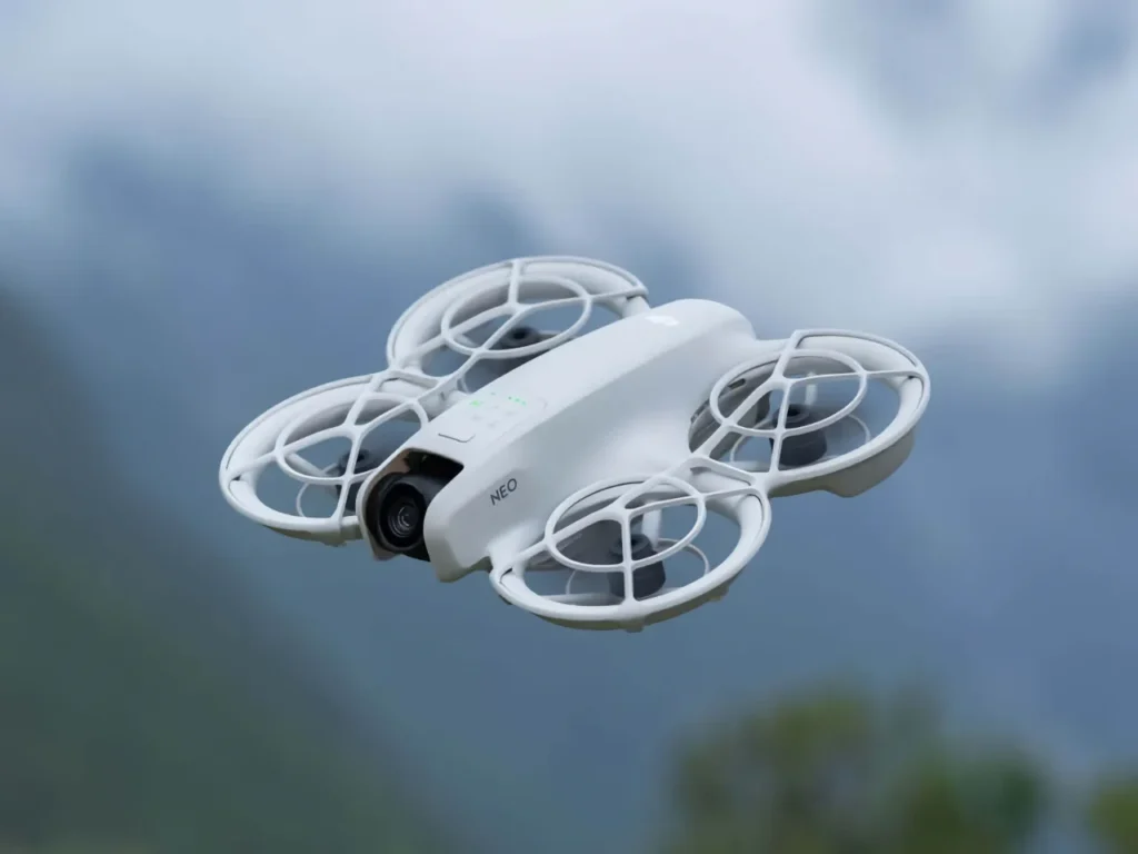 a drone flying in the sky. DJI Neo drone. Best of IFA 2024. {Tech} for Travel. https://techfortravel.co.uk