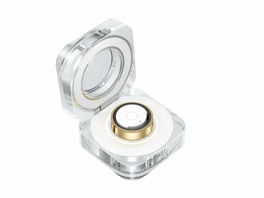 a clear plastic box with a round gold ring inside. Samsung Galaxy Ring.  {Tech} for Travel. https://techfortravel.co.uk