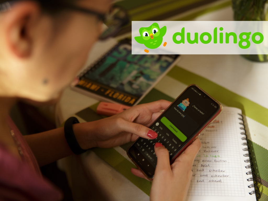 a person using a cell phone. Duolingo. Best Travel Apps 2025.  {Tech} for Travel. https://techfortravel.co.uk