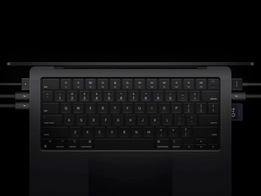 a black laptop with a keyboard. Apple MacBook Pro M4 Specifications.  {Tech} for Travel. https://techfortravel.co.uk