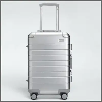 a silver suitcase with wheels. Black Friday Travel Deals. Away Black Friday Sale. {Tech} for Travel. https://techfortravel.co.uk