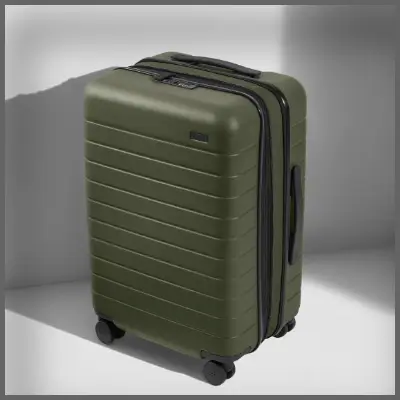 a green suitcase with wheels. Black Friday Travel Deals. Away Black Friday Sale. {Tech} for Travel. https://techfortravel.co.uk